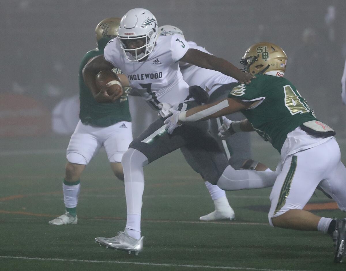 Inglewood quarterback Justyn Martin breaks off a big run against St. Bonaventure during a CIF Southern Section Division 2.