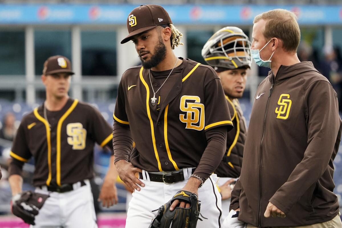 Padres star Tatis has shoulder problem, to be re-evaluated - The San Diego  Union-Tribune