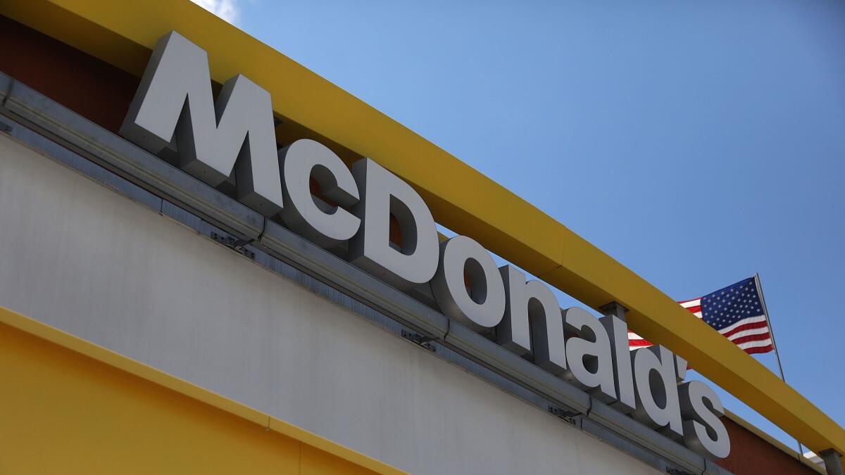 Ten workers, including a 15-year-old, have lodged sexual harassment complaints against McDonald's.