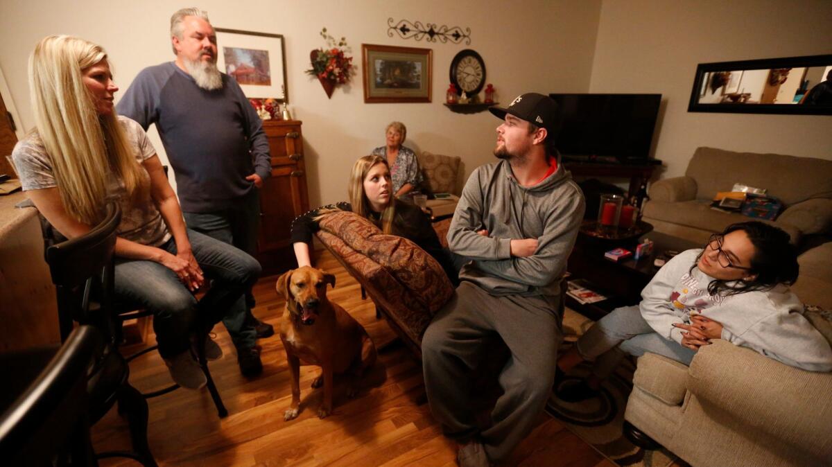 Shelly Lanning, left, her husband, Tom; dog Jax; daughter Emily, 19; Lanning's mother, Jeannie Anderson, 68; Lanning's son Cash, 23; and his wife; Michele Yepez, 22, are all staying with Anderson in Ukiah.