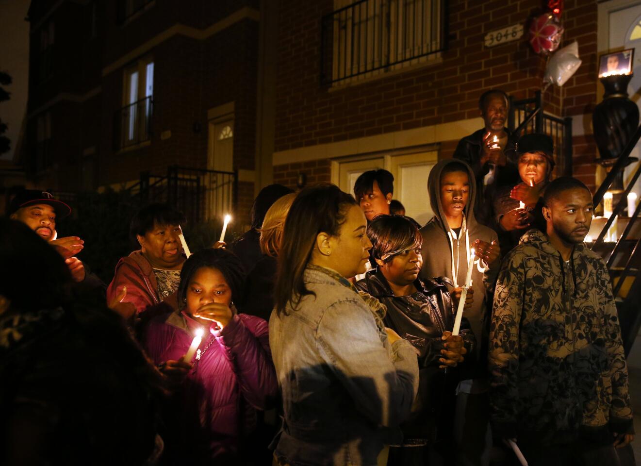 In this 2014 file photo, Family members hold a vigil in the 3000 block of Flournoy Street in Chicago for Afrikka Hardy, who was killed by Darren Vann.