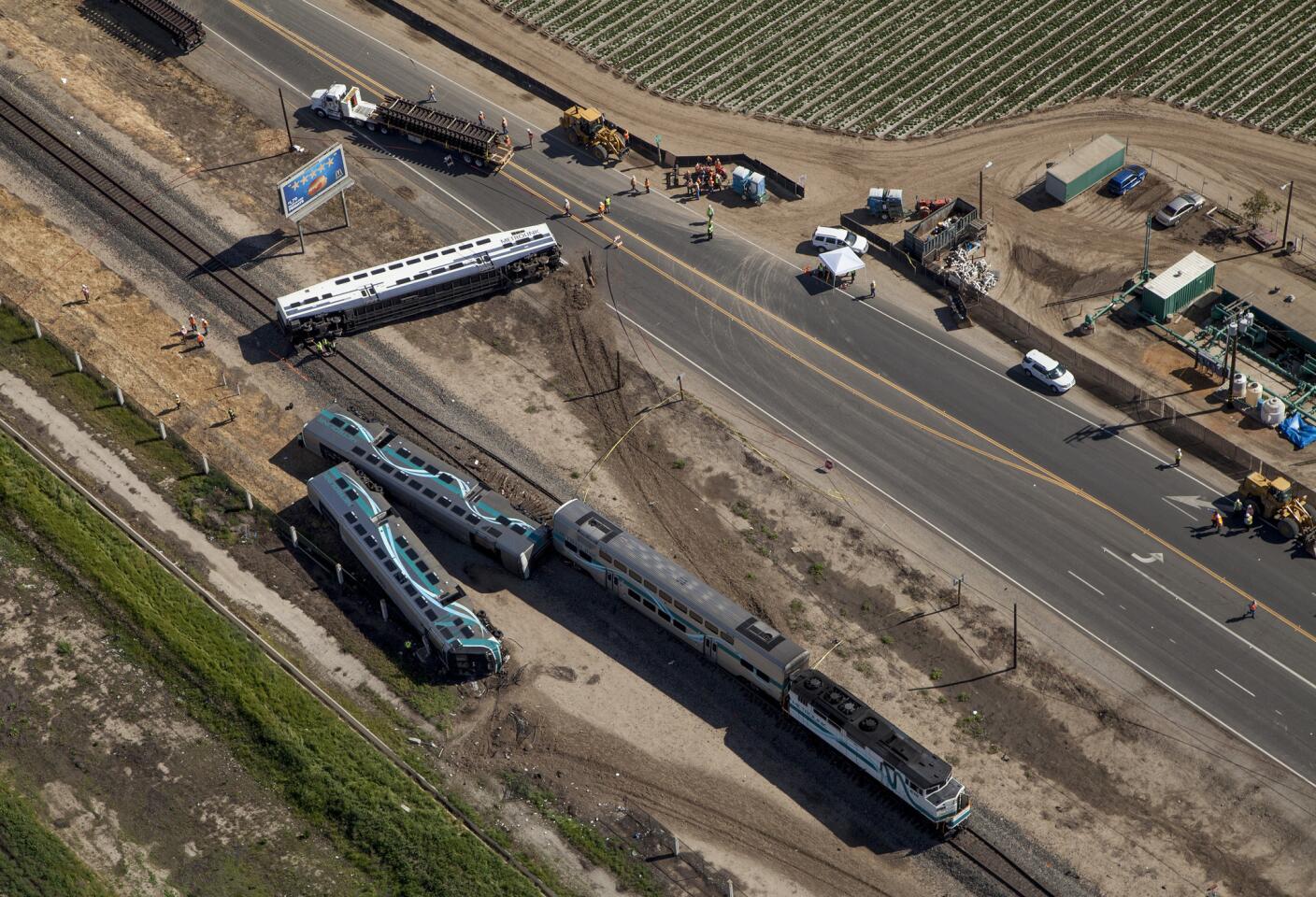 Aerial view of the Metrolink train derailment in Oxnard. The crash occurred at the Rice Avenue crossing, causing three cars to derail and injuring at least 28 people.