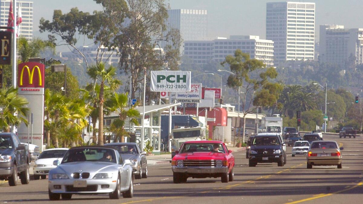 As seen in 2000, traffic travels along the roughly 1-mile section of West Coast Highway in Newport Beach known as Mariners' Mile.