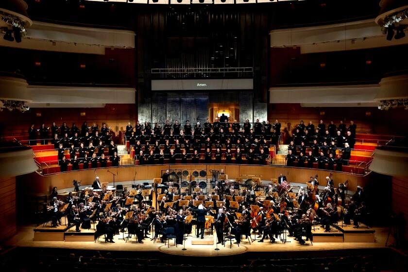 The Pacific Symphony, Pacific Chorale, vocal soloists Elissa Johnston and Christopher Maltman, led by Carl St.Clair