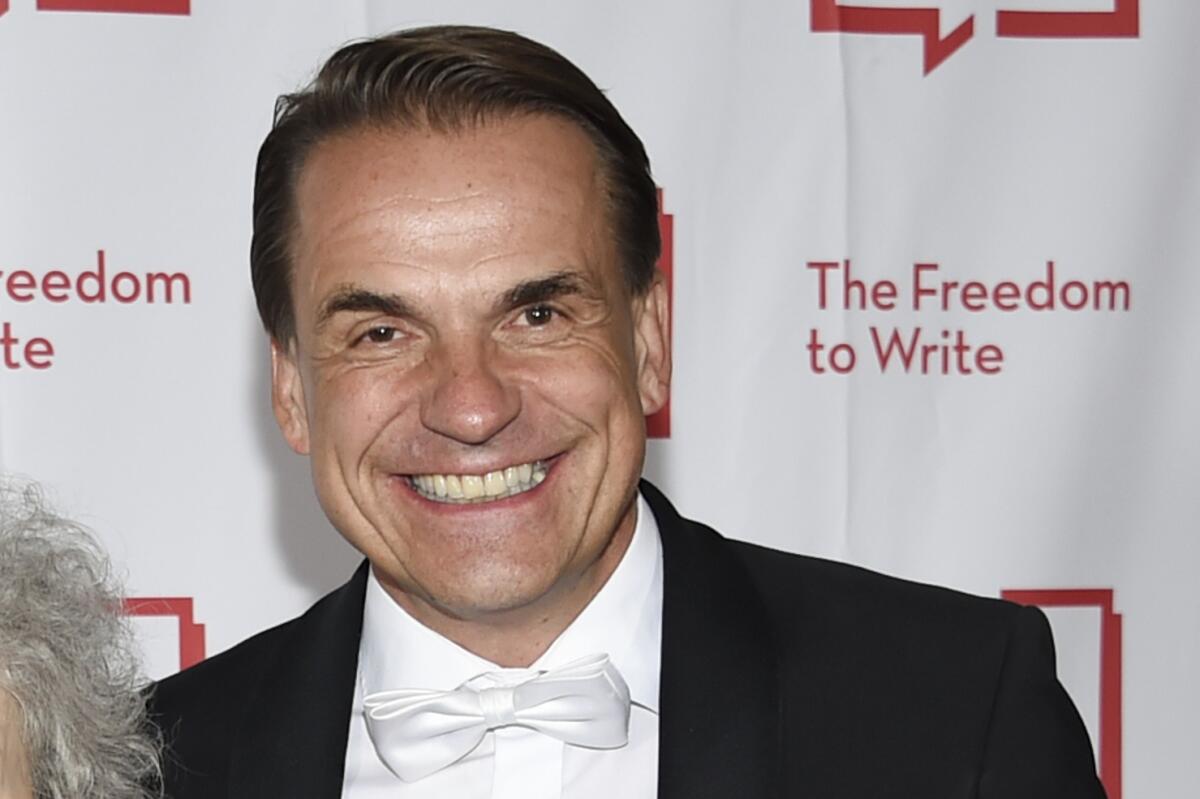 FILE - Penguin Random House CEO Markus Dohle attends the 2018 PEN Literary Gala at the American Museum of Natural History on May 22, 2018, in New York. Dohle on Thursday, Aug. 4, 2022, defended his company’s deal to acquire rival Simon & Schuster against the government’s claim it would thwart competition. But he acknowledged that the merger would buttress his company’s position as the biggest U.S. publisher by expanding its market share. (Photo by Evan Agostini/Invision/AP, File)