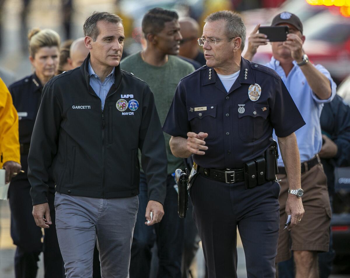 Los Angeles Mayor Eric Garcetti, left, and Police Chief Michel Moore