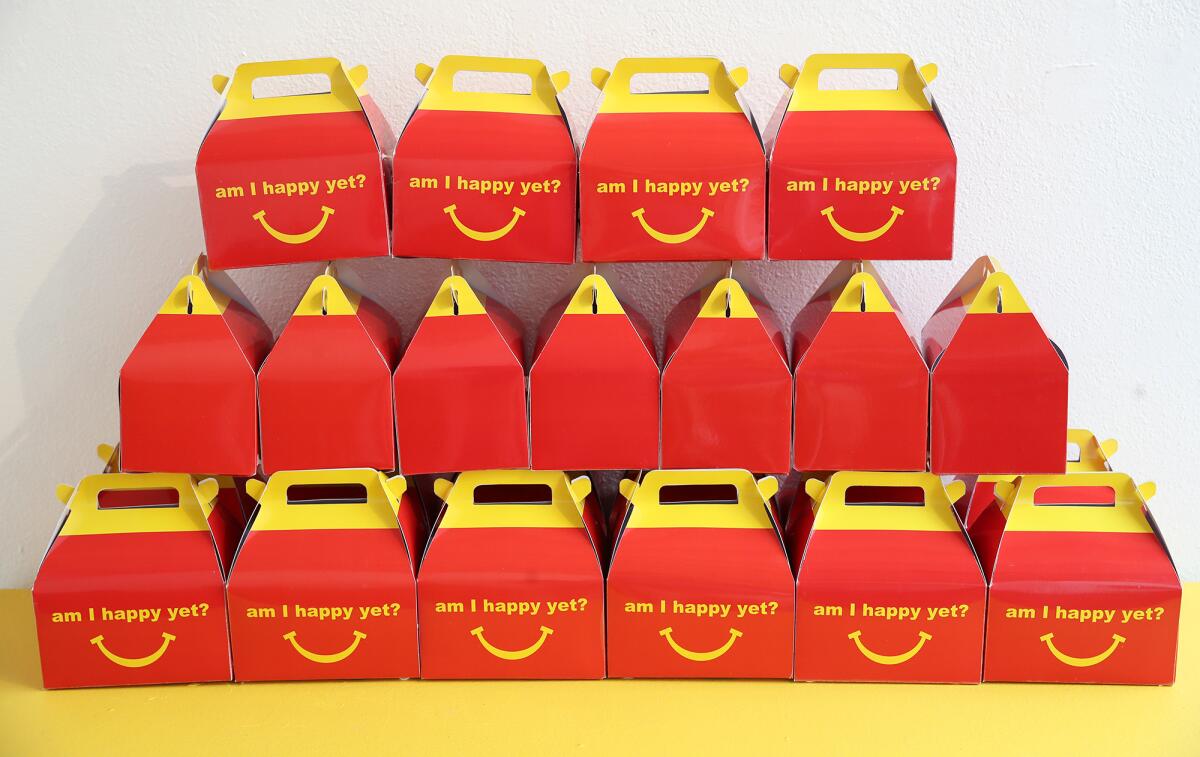 McDonald's lunch boxes are part of Curator Jac Alva's "Unsavory" exhibition at the Muckenthaler Cultural Center in Fullerton.