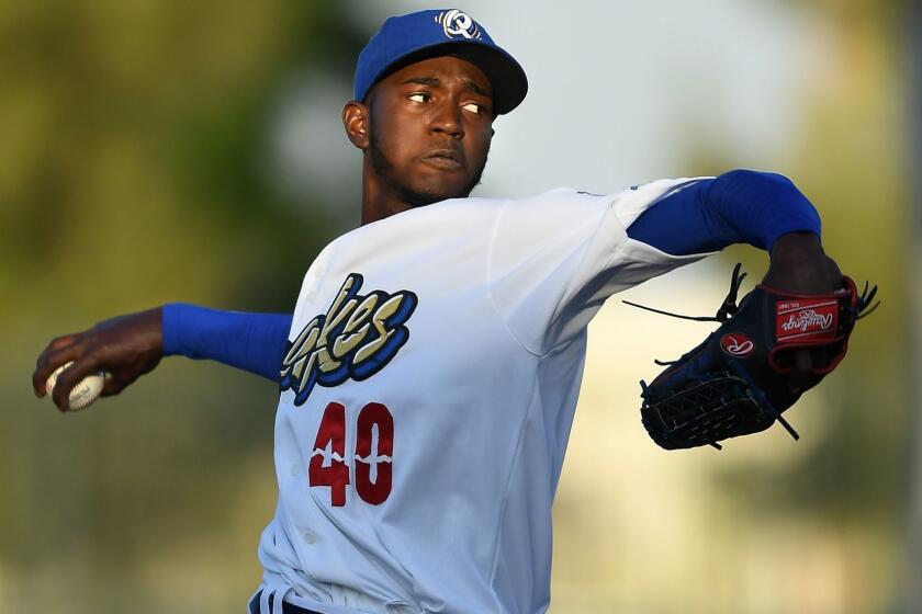 RANCHO CUCAMONGA, CALIFORNIA JUNE 5, 2017-Dodgers pitching prospect Yadier Alvarez throws a pitch for the Rancho Cucamonga Quakes in a recent game. (Wally Skalij/Los Angeles Times)