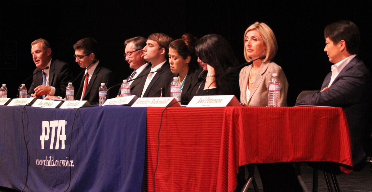 Candidates, from left, Dan Jeffries, Kevork Kurdoghlian, David Sagal, Ian Mirisola, Karyn Riel, Kaitzer Puglia, Jennifer Rubendall, and Joel Peterson at a candidates forum for the La Canada Unified School District board at La Canada High School on Tuesday, October 1, 2013. There are 8 candidates running for 3 open seats.