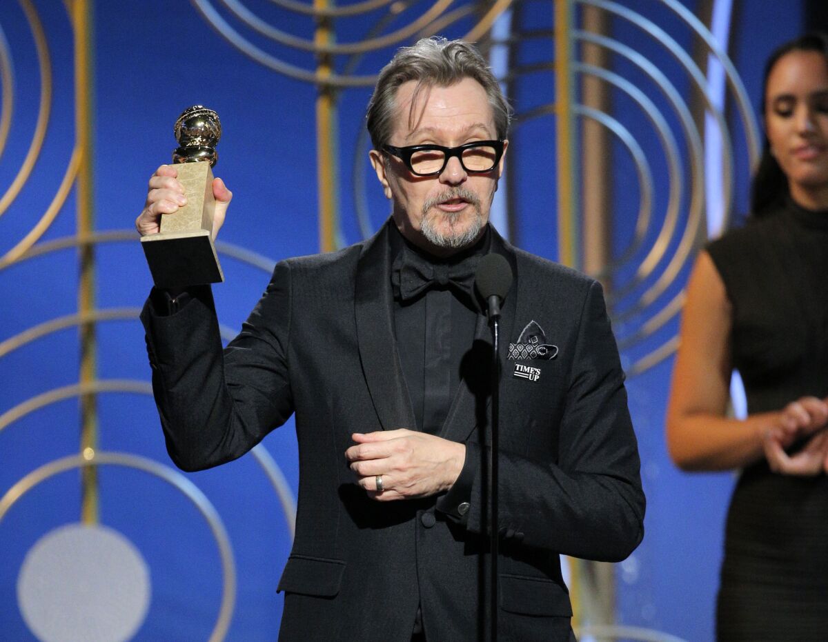 Gary Oldman accepting the award for best actor in a motion picture drama for his role in "The Darkest Hour," at the 75th Annual Golden Globe Awards.