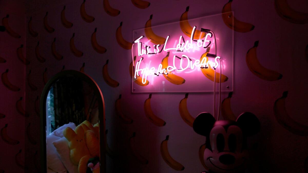 BEVERLY HILLS, CALIFORNIA: March 3, 2017 - A neon sign in the bedroom of Madeline Rose Livingston. Madeline Rose and her mother, Carrie Livingston, made over her bedroom. (Katie Falkenberg / Los Angeles Times)