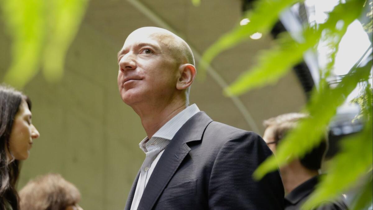 Jeff Bezos tours an Amazon facility at the grand opening of Amazon Spheres in Seattle earlier this year.