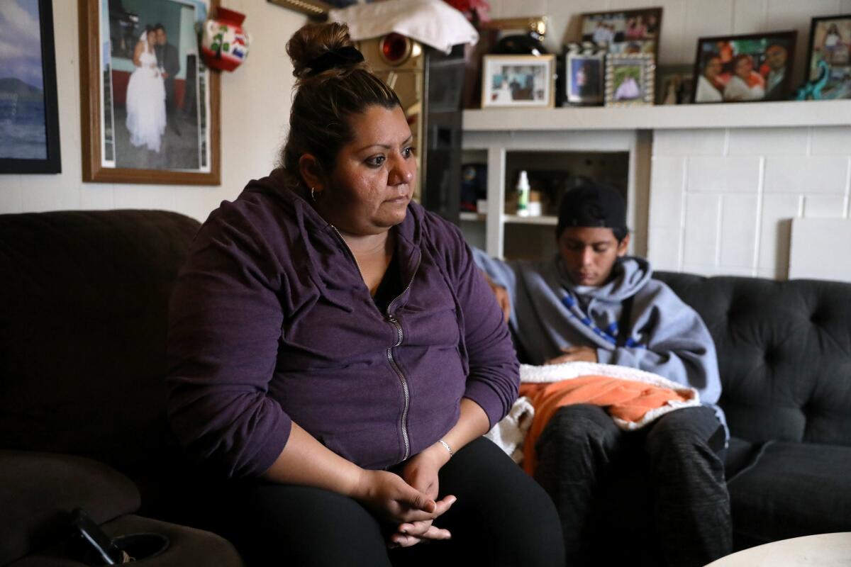 Brenda Mendez with her son David at home in Redondo Beach