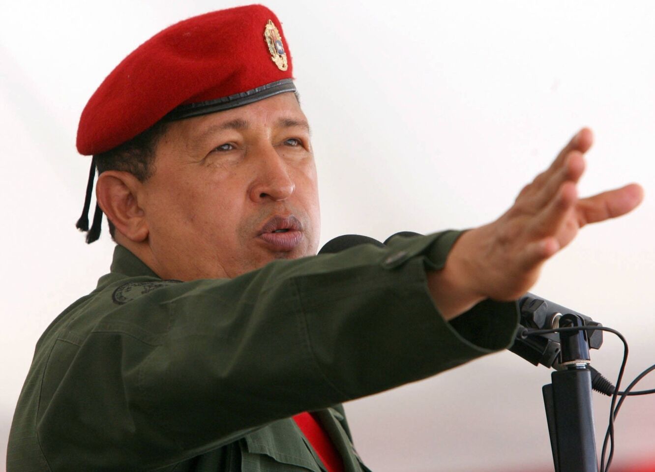Love him or hate him, Venezuelan President Hugo Chavez, who died of cancer in March, was one of the most influential figures in Latin America in recent years. The former paratrooper-turned-president used his country's vast oil wealth to improve life for the poor in Venezuela, reducing the percentage of people living in extreme poverty as well as illiteracy rates. And his decision to establish Petrocaribe, an alliance whereby Venezuela ships petroleum to other nations, such as Haiti, at below-market prices, helped combat poverty abroad. But even as he pushed more resources toward improving the lives of the region's have-nots, he also used his power to attack critics and censored the media, as well as to consolidate his hold on power. His death has created uncertainty at home and abroad. His successor, Nicolas Maduro, has struggled to stabilize the country's economic troubles, raising doubts about the future of Petrocaribe. Above: Chavez gives a speech in 2006. RELATED: Ted Rall's five best cartoons of 2013 Washington's 5 biggest 'fails' of 2013 2013 endings: Columnist Patt Morrison on what she won't miss