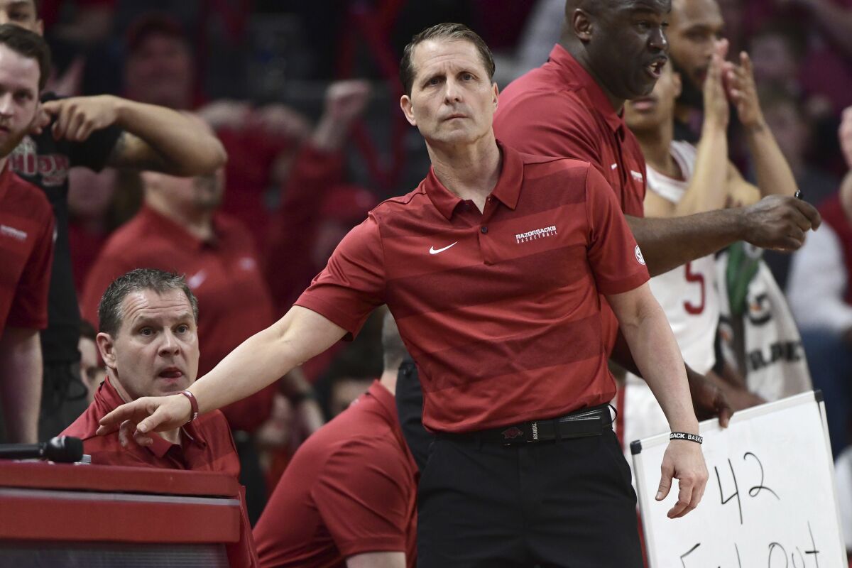 FILE - In this Wednesday, March 4, 2020, file photo, Arkansas coach Eric Musselman reacts on the sidelines against LSU during the first half of an NCAA college basketball game in Fayetteville, Ark. This season, a host of newcomers will have opportunities for second-year coach Musselman. (AP Photo/Michael Woods, File)