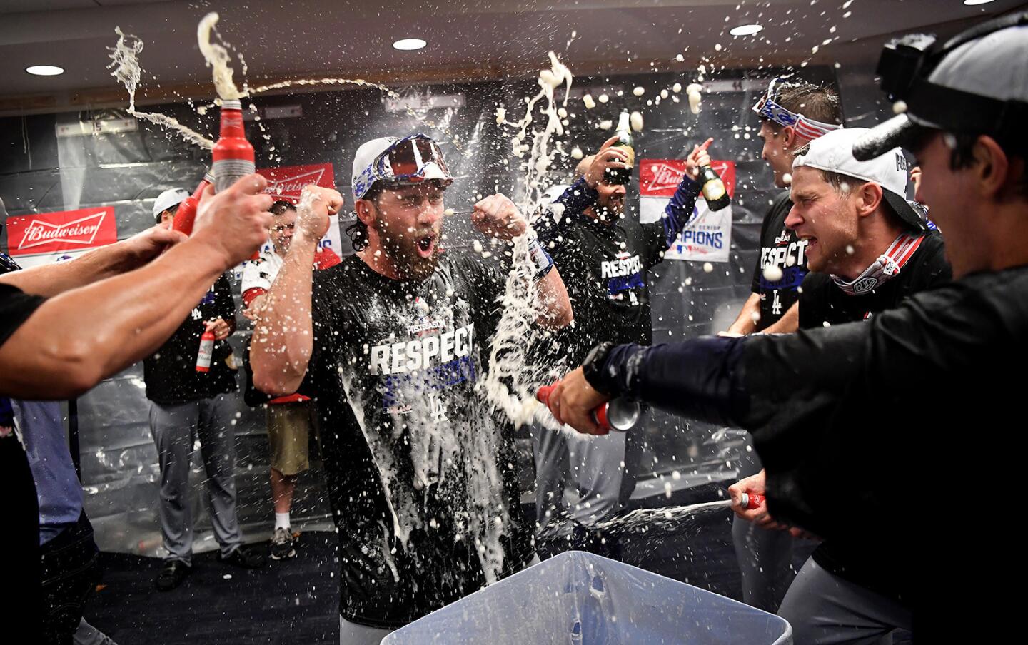 Dodgers Charlie Culberson players celebrates in the locker room after defeating the Nationals in Game 5 of the NLDS.