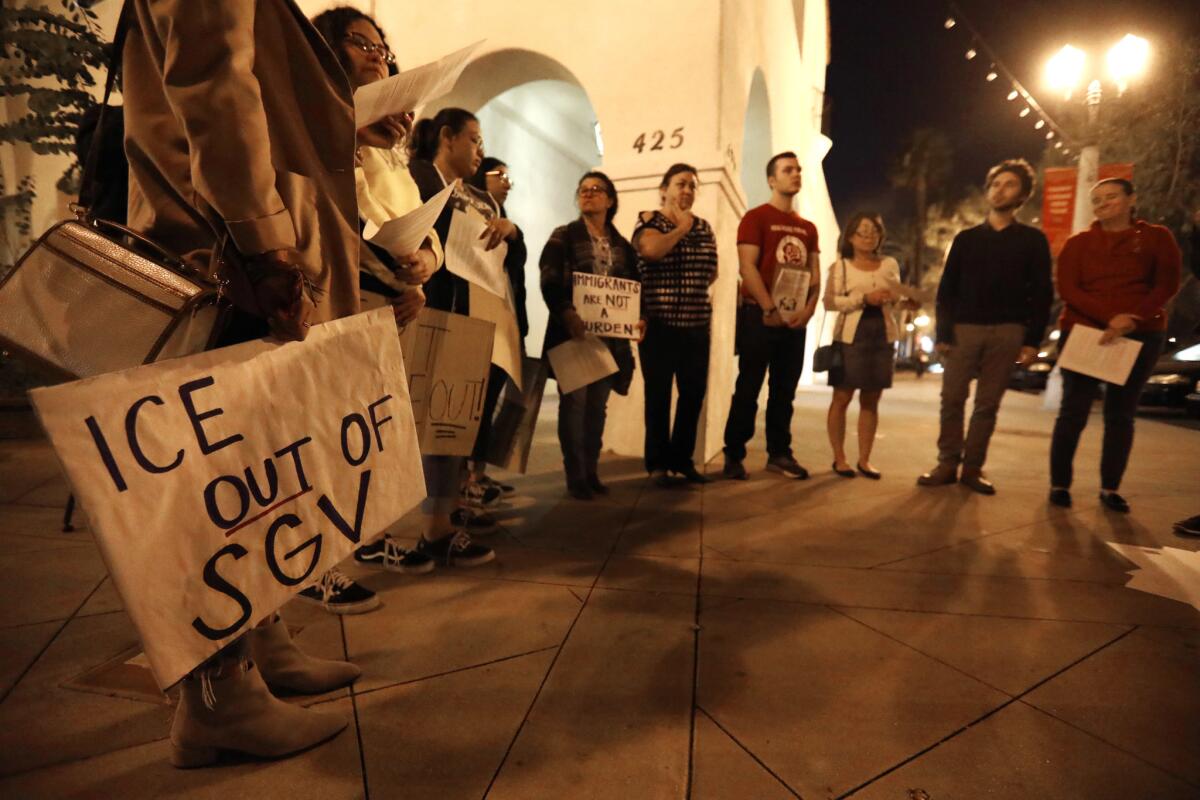 Advocacy groups rally in front of City Hall in San Gabriel to express their concern about the San Gabriel Police Department's working with Immigration and Customs Enforcement.