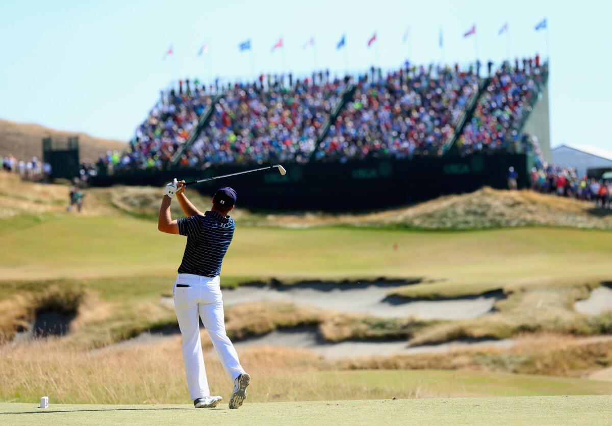 Jordan Spieth watches his tee shot on the ninth hole during the final round of the 115th U.S. Open at Chambers Bay in University Place, Wash.