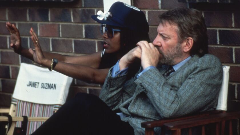 Director Euzhan Palcy shown on set with actor Donald Sutherland during filming of the 1989 movie "A Dry White Season."