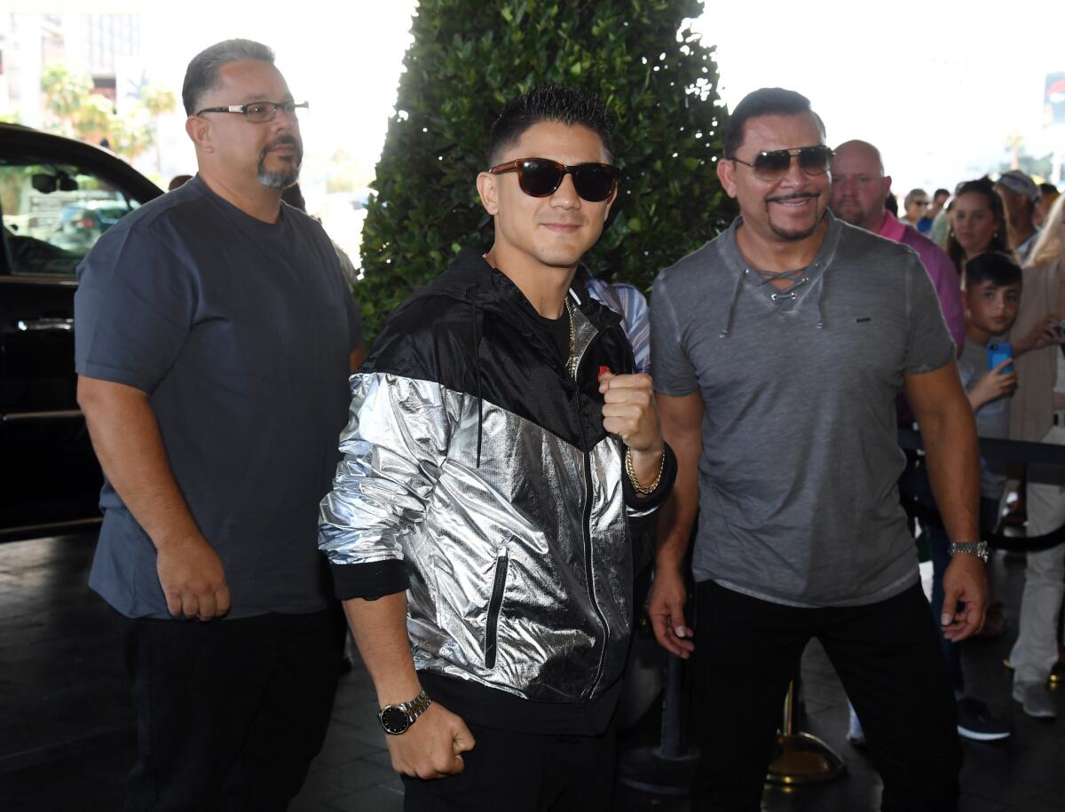 LAS VEGAS, NV - SEPTEMBER 12: Boxer Joseph Diaz Jr. (C) arrives at MGM Grand Hotel & Casino on September 12, 2017 in Las Vegas, Nevada. Diaz will fight Jorge Lara in a featherweight bout at T-Mobile Arena on September 16 in Las Vegas.