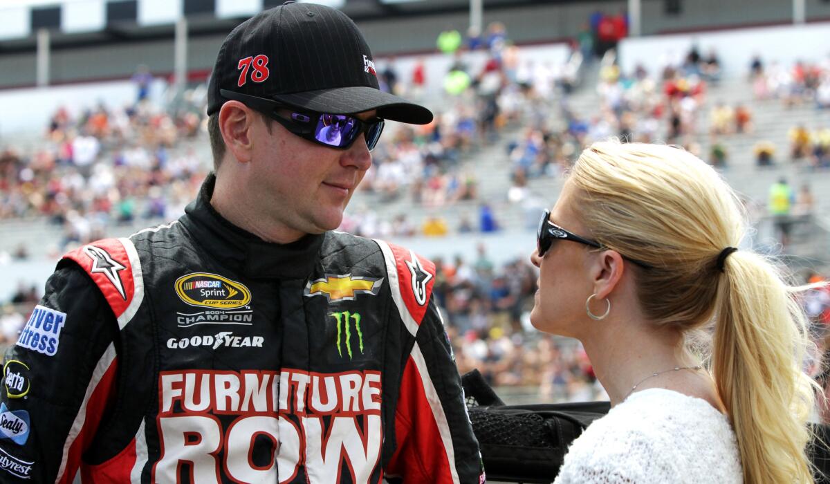 NASCAR driver Kurt Busch and former girlfriend Patricia Driscoll before a Sprint Cup race at Pocono Raceway on June 9, 2013, in Long Pond, Pa.