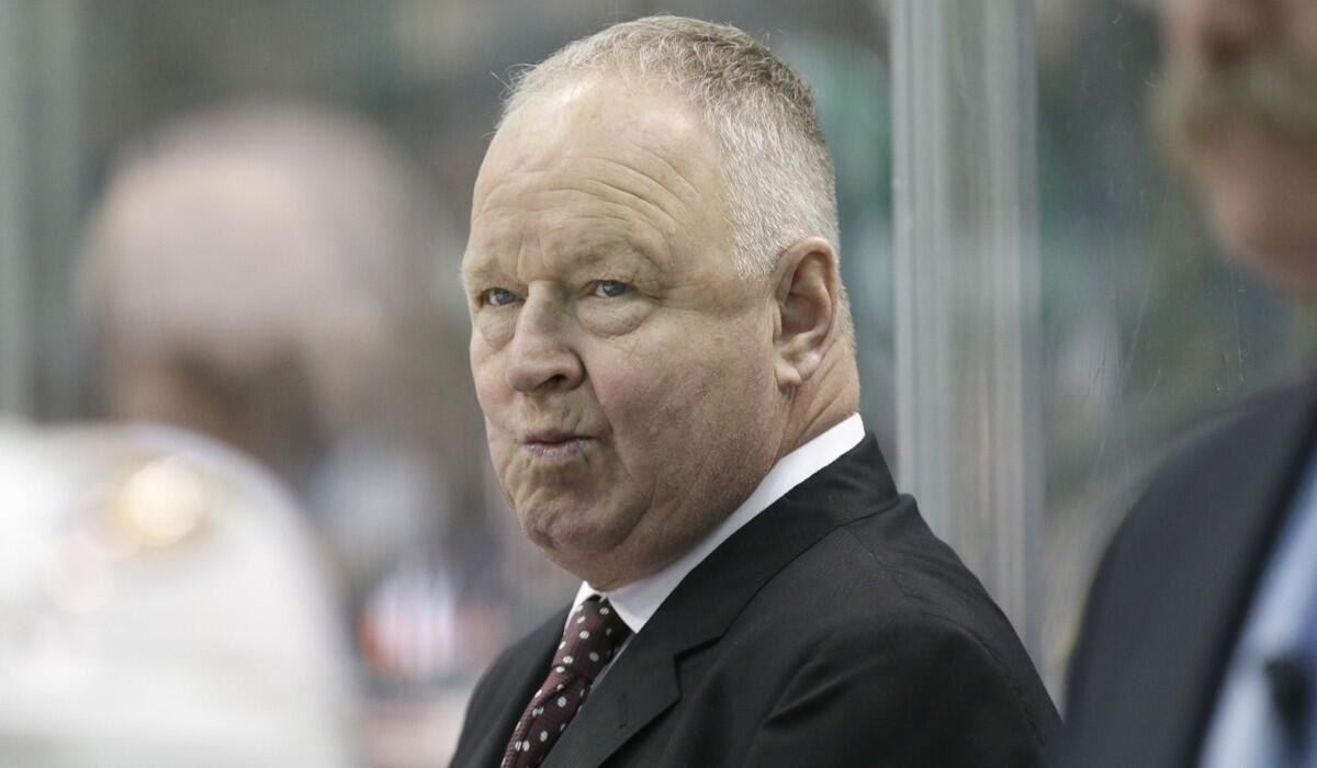 Ducks Coach Randy Carlyle watches from the bench during the first period of a game against the Dallas Stars on Dec. 13.