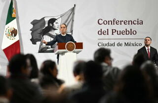 Mexico's President Claudia Sheinbaum speaks as Secretary of Security and Civilian Protection Omar García Harfuch looks on