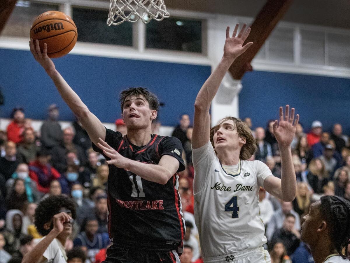 Harvard-Westlake's Brady Dunlap attempts a layup against Notre Dame's Dusty Stromer.