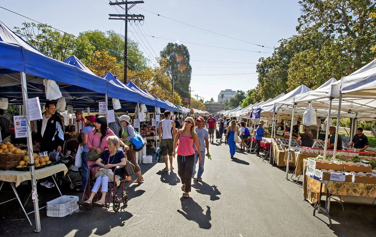 As pictured in 2013--the  Brentwood farmers market on a Sunday on Gretna Green Way between San Vicente Boulevard and Montana Ave