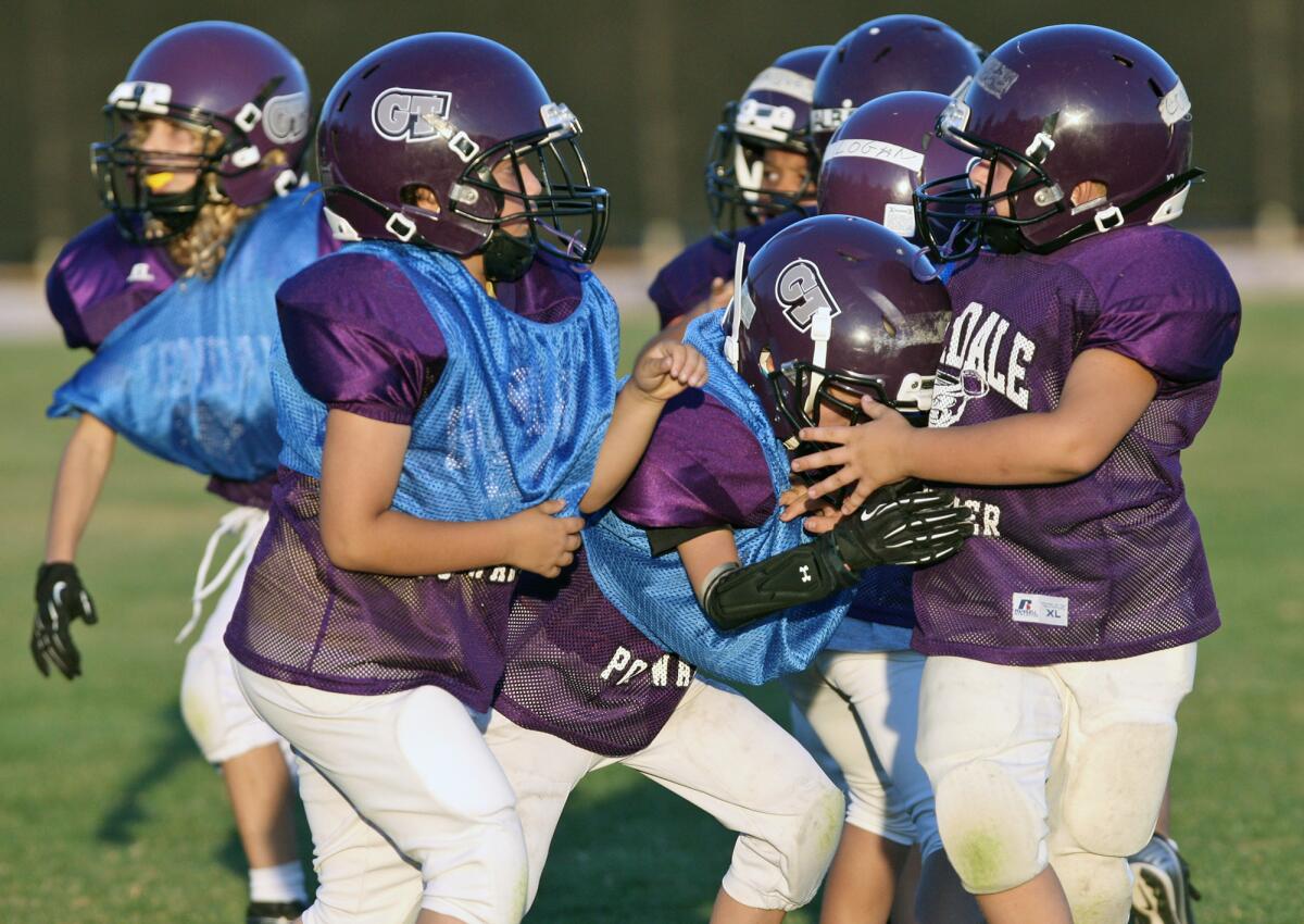 Glendale Tornados complete drills during practice at Hoover High School in Glendale on Wednesday, Aug. 21, 2013.