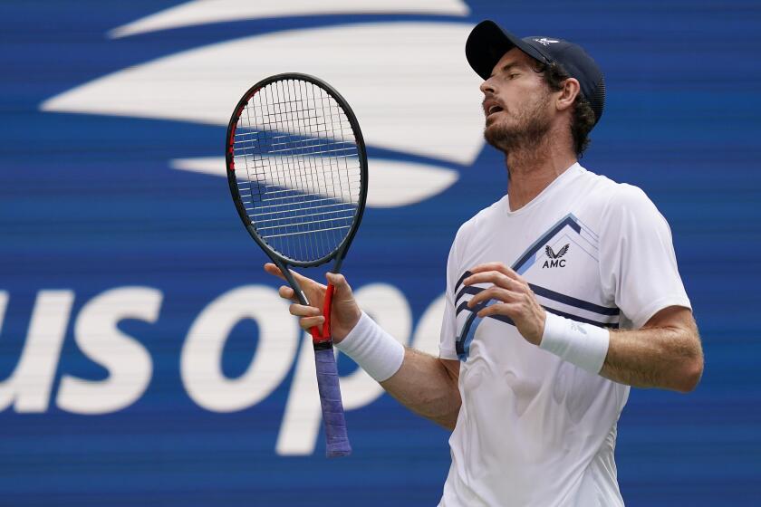 Andy Murray, of Great Britain, reacts after losing a point to Stefanos Tsitsipas, of Greece.