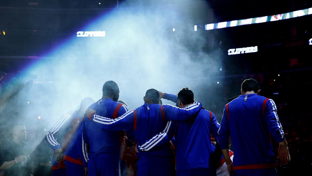 Clippers take part in player introductions before a playoff game against the Golden State Warriors at Staples Center in April.