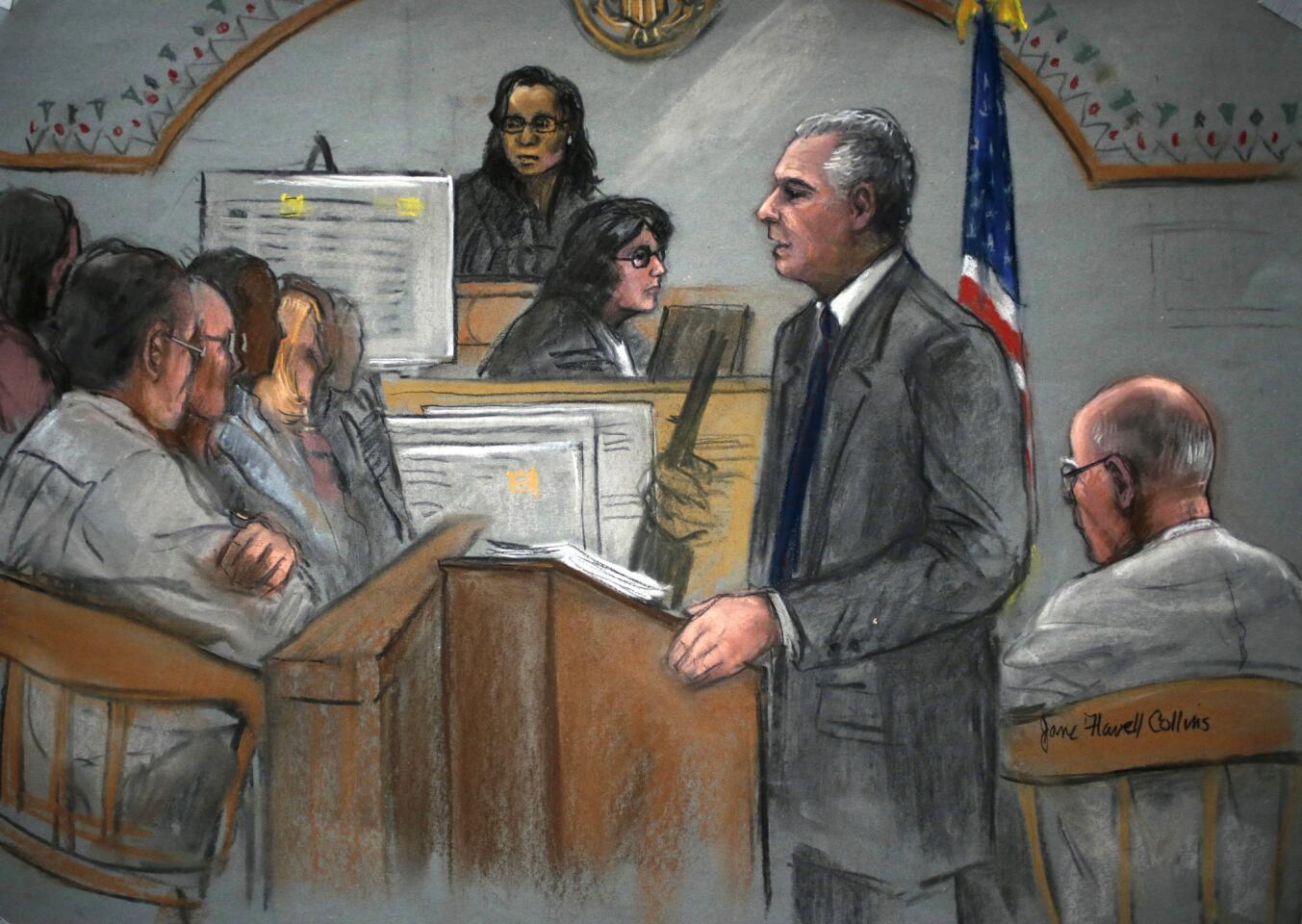 In this courtroom sketch, prosecutor Fred Wyshak, standing, speaks during closing arguments in the trial of James "Whitey" Bulger, right, at U.S. District Court, in Boston on Aug. 5, 2013. A federal prosecutor summed up the government's case by calling Bulger "one of the most vicious, violent and calculating criminals ever to walk the streets of Boston," and urged the jury to convict him of charges that include 19 killings committed during the 1970s and '80s.