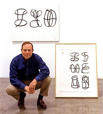 Artist Craig Kauffman with sketches of sculptures he was working on for a show in 1998. See full story