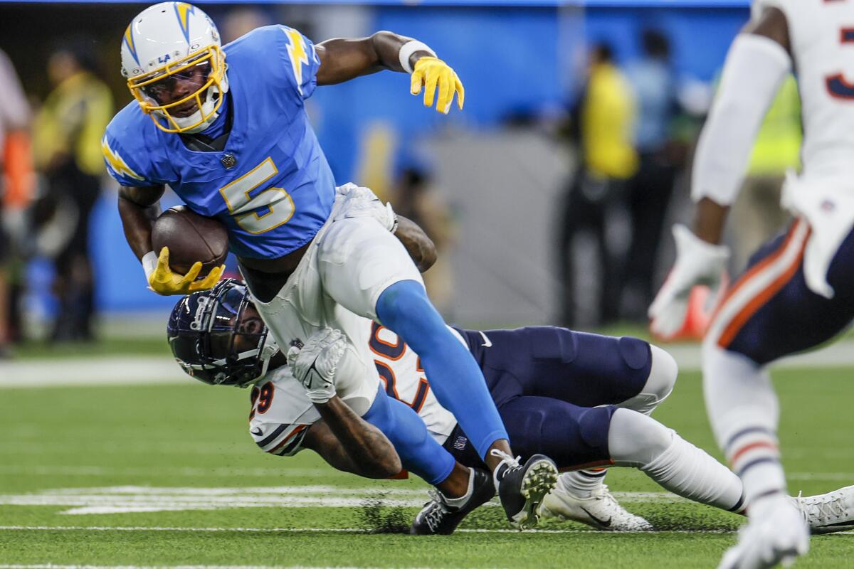Chargers wide receiver Joshua Palmer (5) runs after a catch against the Bears.