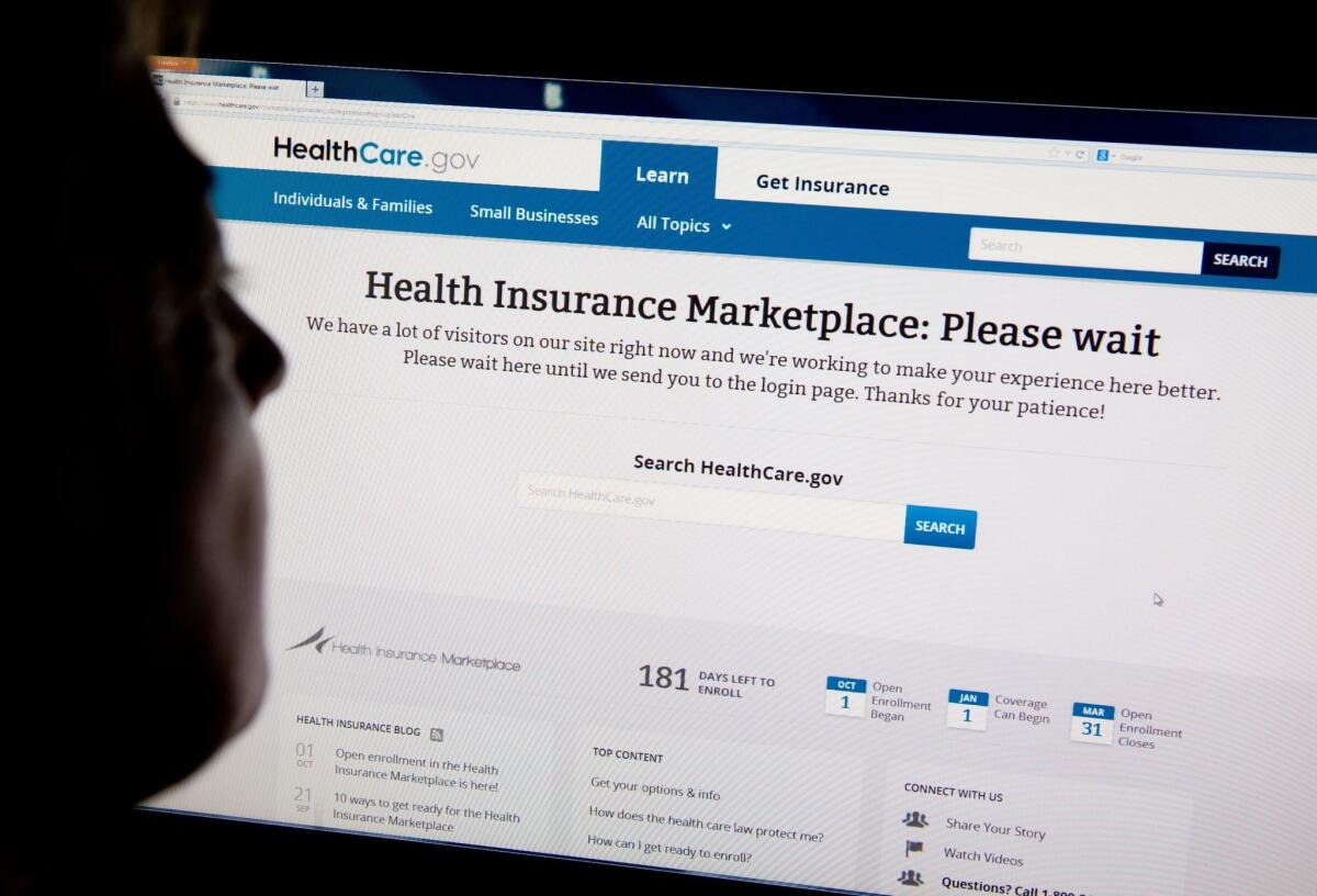 A woman looks at the HealthCare.gov insurance exchange internet site showing a "please wait" page. The troubled rollout of the "Obamacare" website has been described by some U.S. lawmakers as a half-billion-dollar debacle.
