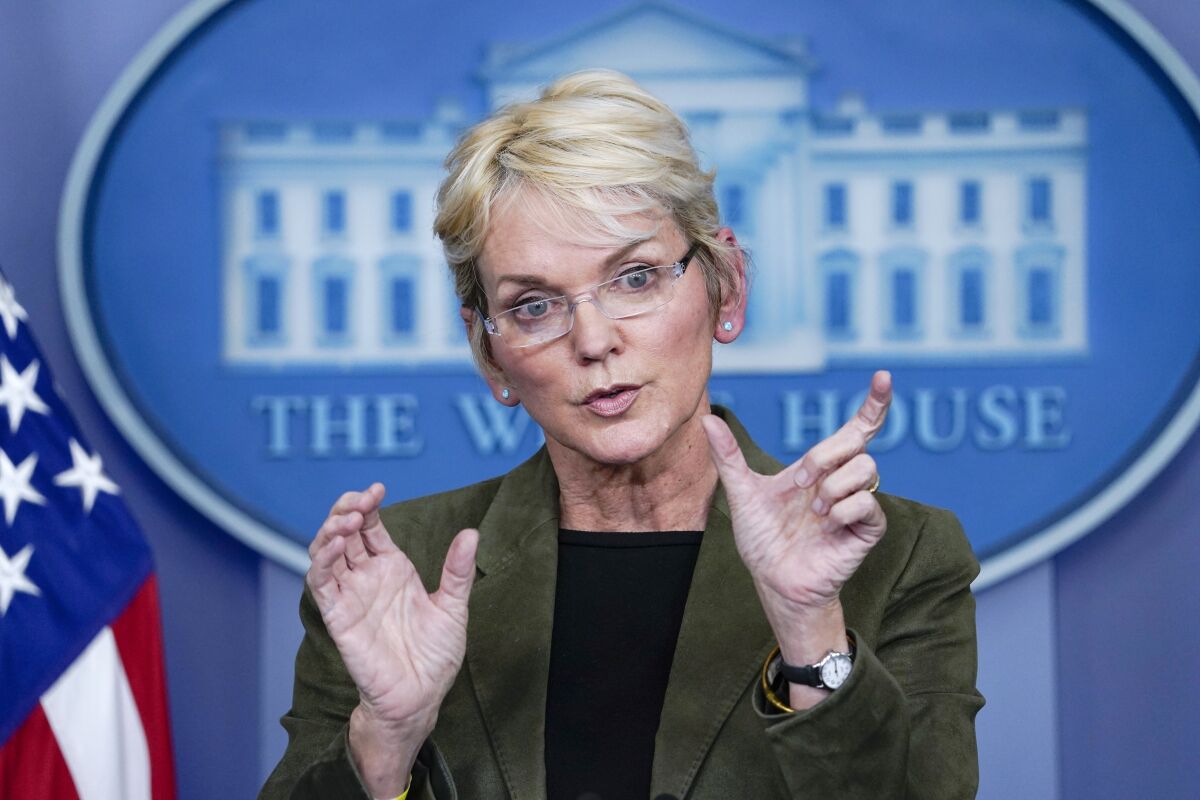 FILE - Energy Secretary Jennifer Granholm speaks during a press briefing at the White House, Nov. 23, 2021, in Washington. The Biden administration has issued its first clean energy loan guarantee, reviving an Obama-era program that disbursed billions of dollars in guarantees to help launch the country's first utility-scale wind and solar farms a decade ago but has largely gone dormant in recent years. The Energy Department said it would guarantee up to $1 billion in loans to help a Nebraska company scale up production of "clean" hydrogen to convert natural gas into commercial products that enhance tires and produce ammonia-based fertilizer. (AP Photo/Evan Vucci, File)