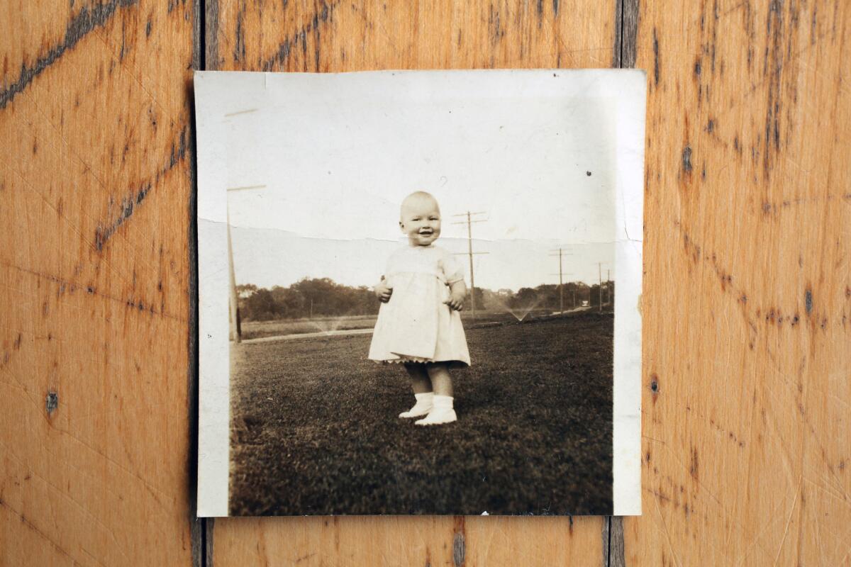 Dorien Hammann, who was given up for adoption by her mother, is seen in a photo from her childhood. Hammann, now 83, recently reconnected with her birth mother, 99.