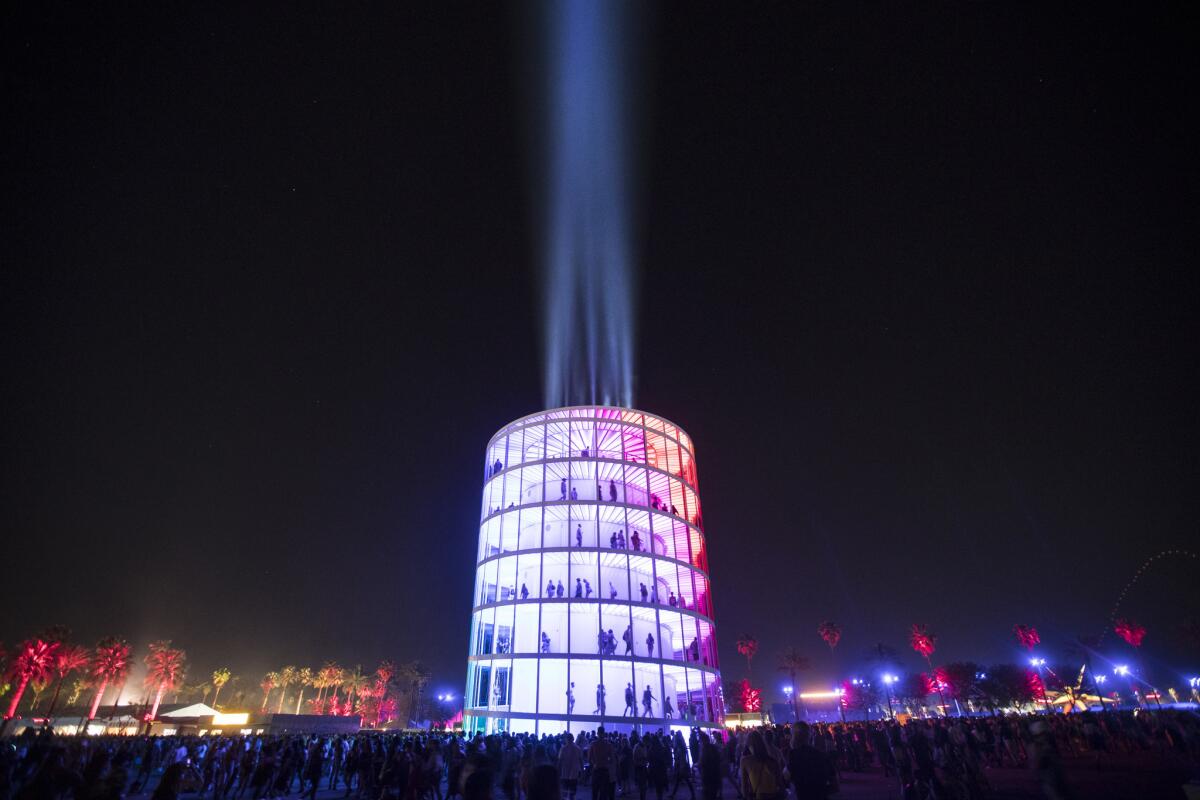 Beams of light emit from the Spectra installation at the Coachella Valley Music and Arts Festival.