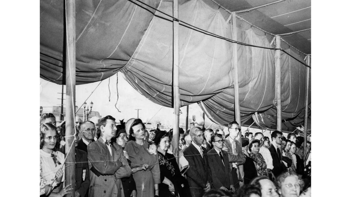 Oct. 30, 1949: Overflow crowd at large tent waiting to hear Dr. Billy Graham speak.