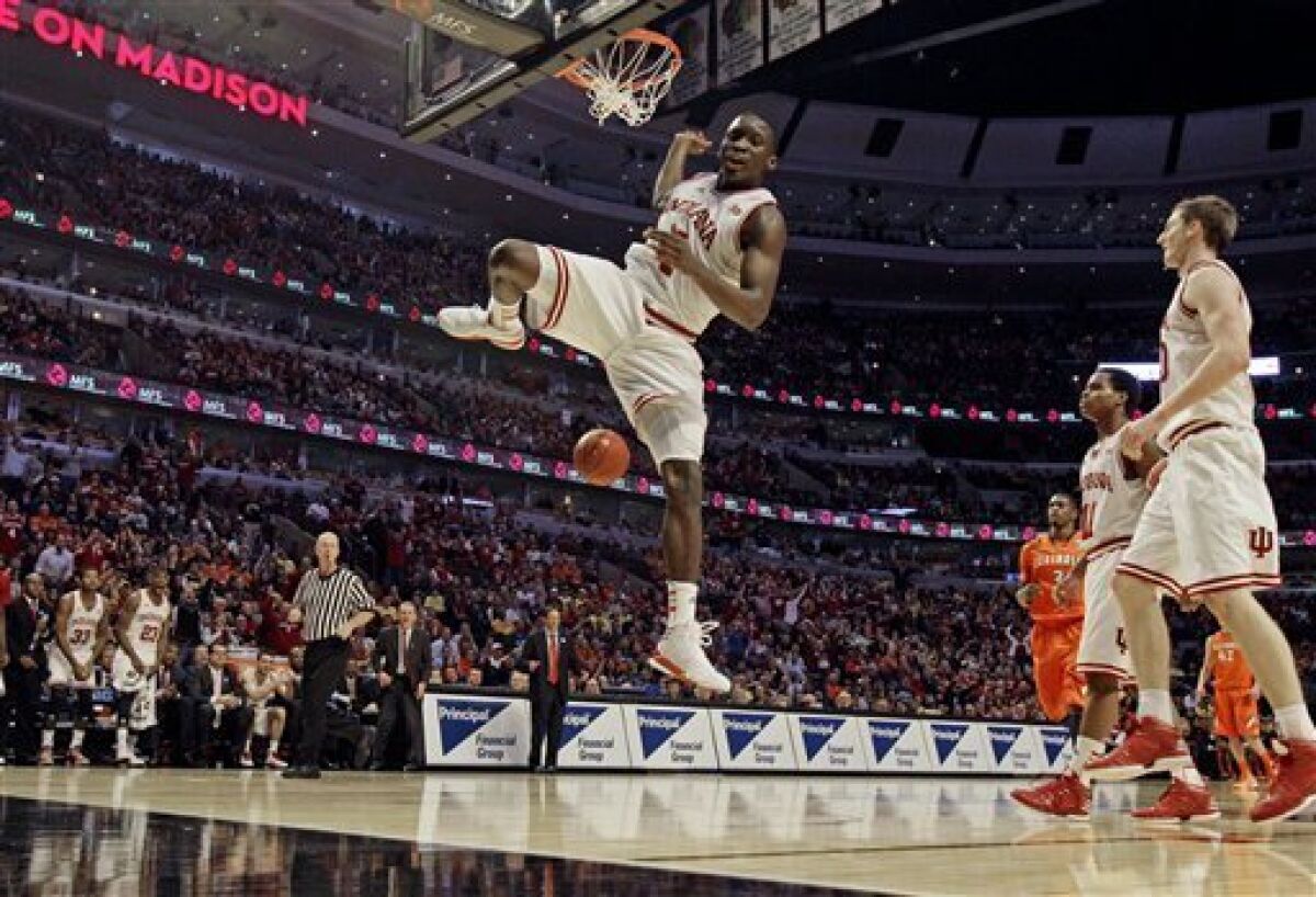 Indiana's Victor Oladipo dunks during the second half of an NCAA college basketball game at the Big Ten tournament against Illinois Friday, March 15, 2013, in Chicago. Indiana won 80-64. (AP Photo/Nam Y. Huh)
