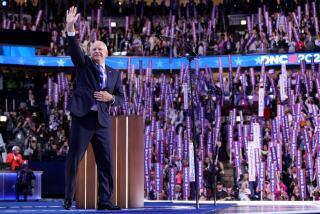 DNC CHICAGO, IL AUGUST 21, 2024 - Democratic vice presidential nominee Minnesota Gov. Tim Walz waves during the Democratic National Convention Wednesday, Aug. 21, 2024, in Chicago. (Robert Gauthier/Los Angeles Times)