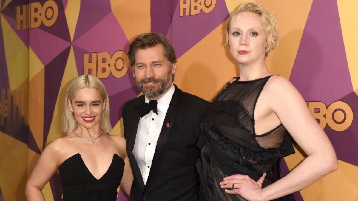 Emilia Clarke, left, Nikolaj Coster-Waldau and Gwendoline Christie arrive at the HBO after-party at the Beverly Hilton Hotel.