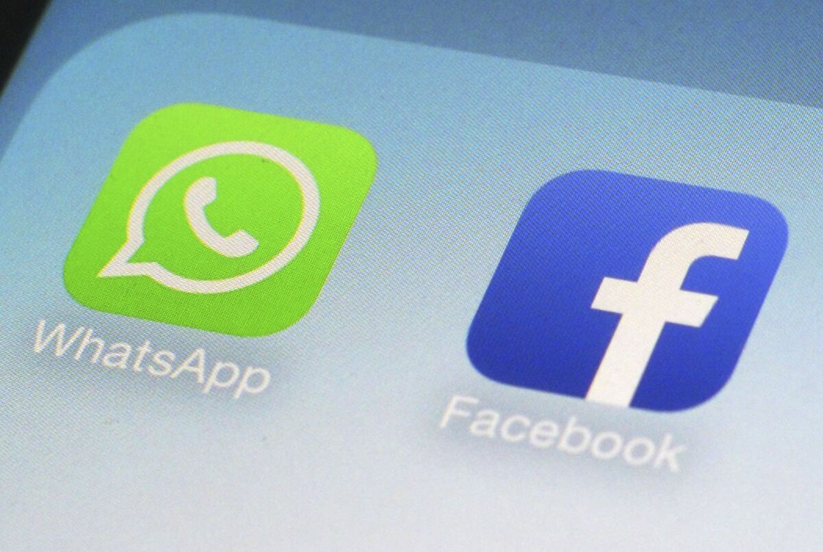 FILE - This Feb. 19, 2014, file photo, shows WhatsApp and Facebook app icons on a smartphone in New York. Facebook and its Instagram and WhatsApp platforms were down in parts of the world on Monday, Oct. 4, 2021. The company said it was “aware that some people are having trouble accessing Facebook app" and it was working on restoring access. (AP Photo/Patrick Sison, File)
