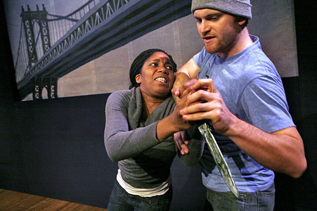 Sarah Stephens and Robert Grant rehearse a fight scene for one of the plays in "The Great Recession."