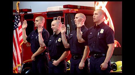 Being sworn in as probationary firefighters are from left Eddie Diaz, Spencer Hammond, Jason Pickard and Hector Sosa, at the Glendale Fire Department promotion ceremony, held at Station 21 in Glendale on Thursday, Jan. 17, 2019.