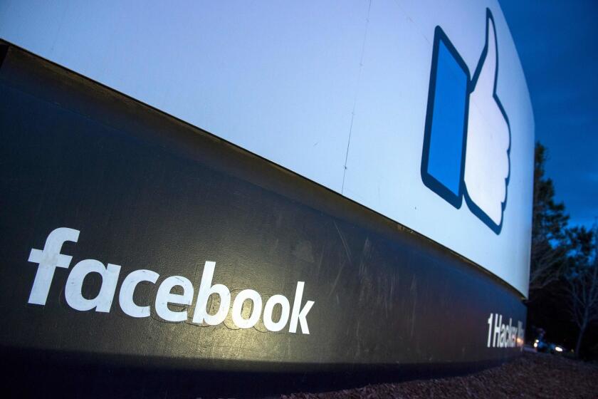 (FILES) In this file photo taken on March 21, 2018 a lit sign is seen at the entrance to Facebook's corporate headquarters location in Menlo Park, California. Facebook said April 4, 2018 it is updating its terms on privacy and data sharing to give users a clearer picture of how the social network handles personal information.The move by Facebook follows a firestorm over the hijacking of personal information on tens of millions of users by a political consulting firm which sparked a raft of investigations worldwide. / AFP PHOTO / JOSH EDELSONJOSH EDELSON/AFP/Getty Images ** OUTS - ELSENT, FPG, CM - OUTS * NM, PH, VA if sourced by CT, LA or MoD **