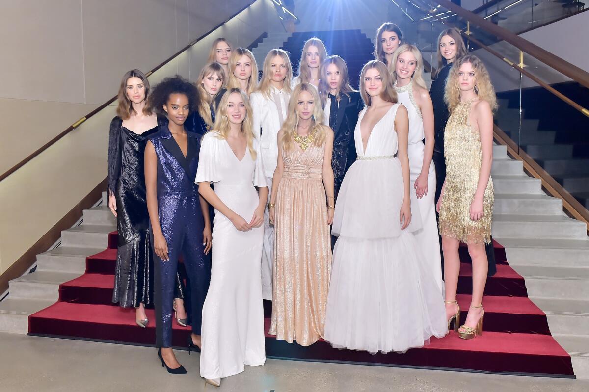 Rachel Zoe, center, flanked by models wearing looks from Zoe's women's fall 2018 collection. Zoe's West Coast fashion show was at the Jeremy Hotel in West Hollywood this month.