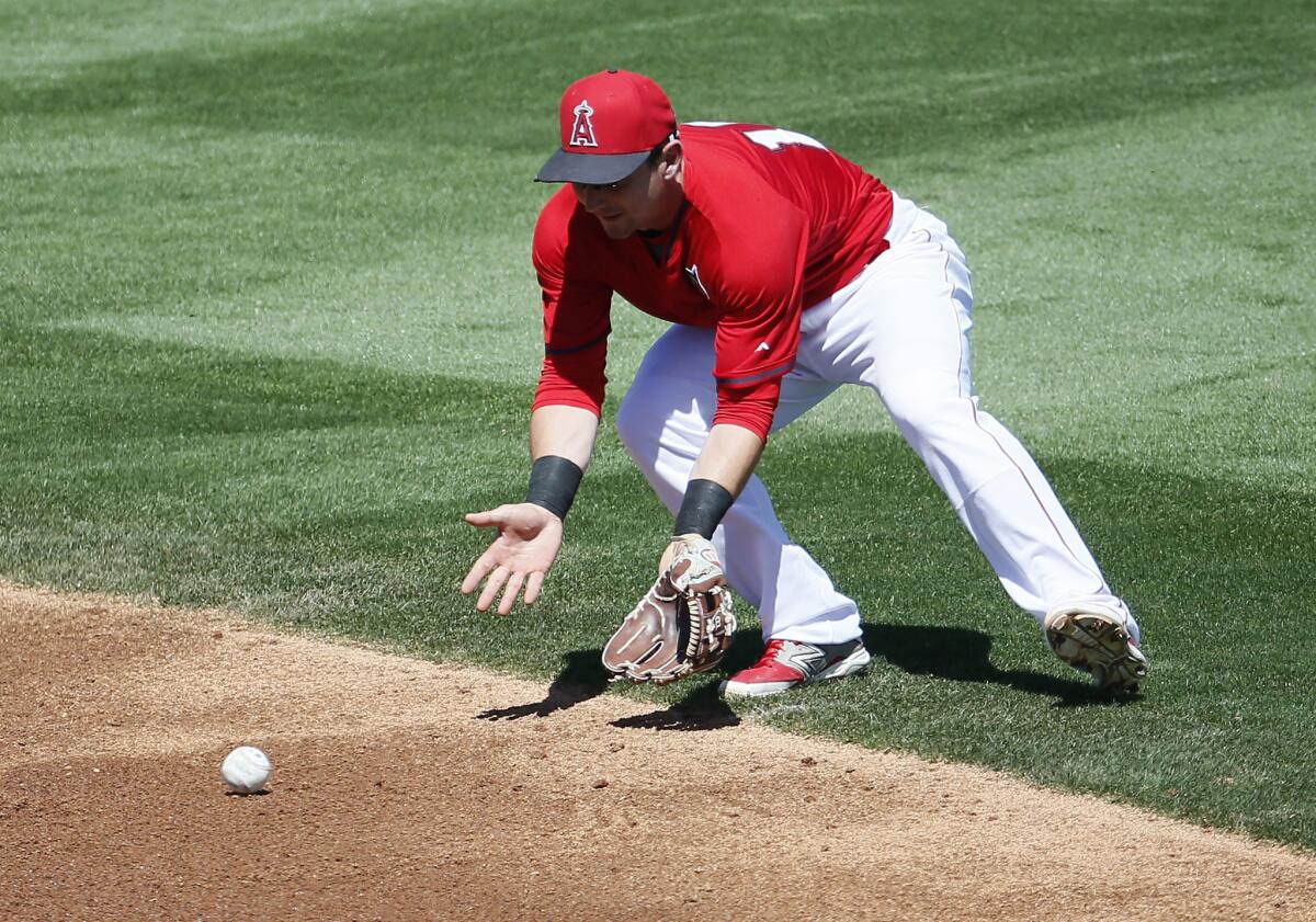 Johnny Giavotella enhanced his chances of earning the Angels second baseman position with three hits against the Cubs on Wednesday.