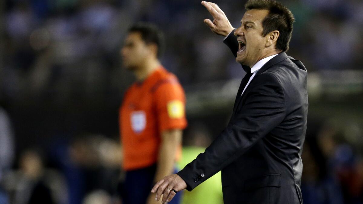 Brazil Coach Dunga yells direction to his players during a 2018 World Cup qualifying soccer match against Argentina in Buenos Aires last November.